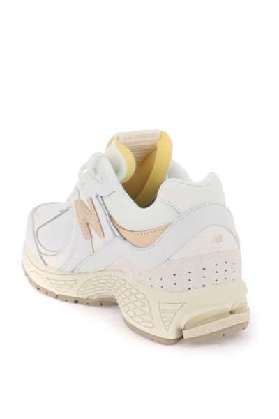 Shop New Balance 2002r Sneakers In Bright White (white)