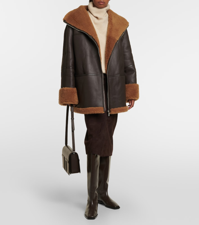 Shop Totême Signature Shearling-lined Leather Jacket In Brown