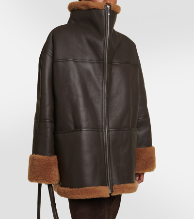 Shop Totême Signature Shearling-lined Leather Jacket In Brown