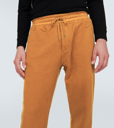 Shop Saint Laurent Cotton Sweatpants In Orange