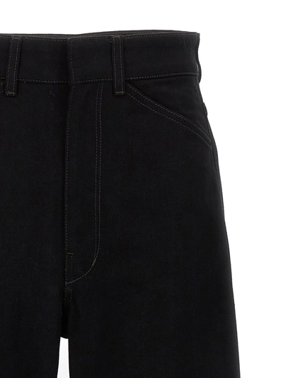 Shop Lemaire Curved Jeans In Black