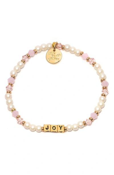 Shop Little Words Project Joy Beaded Stretch Bracelet In Pearl Pink