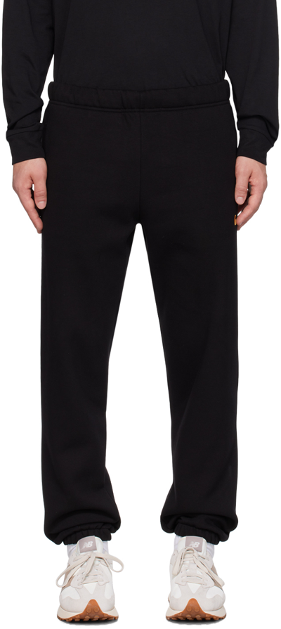 Carhartt Black Chase Sweatpants In 00f Black / Gold