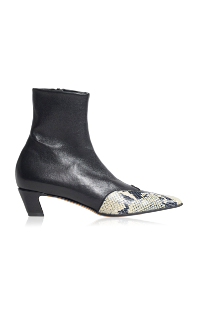 Shop Khaite Dallas Leather Ankle Boots In Black