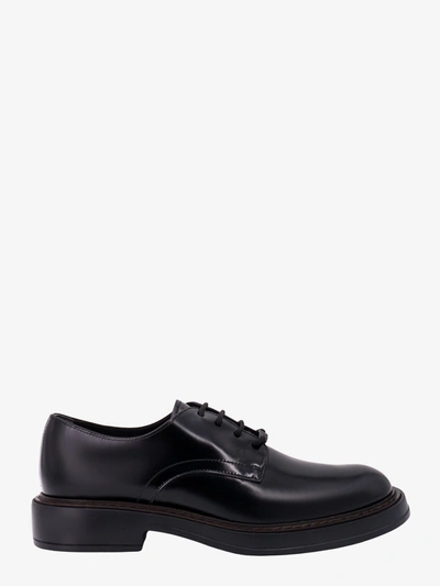 Shop Tod's Leather Lace Up In Black