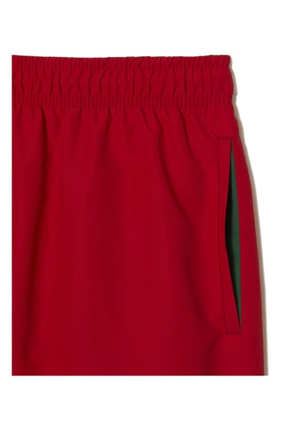 Shop Lacoste Recycled Polyester Swim Trunks In 8un Rouge/ Vert