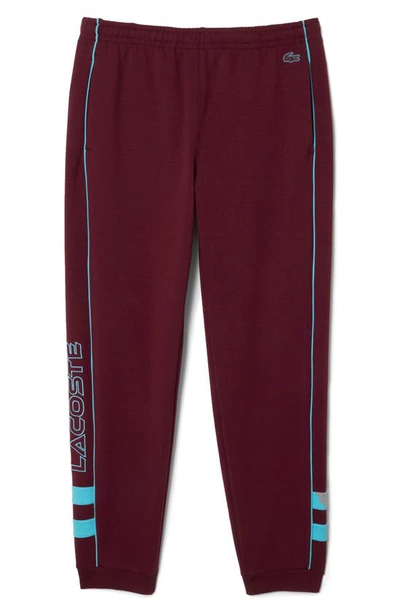 Shop Lacoste Knit Track Pants In Burgundy/ Anse