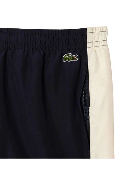 Shop Lacoste Regular Fit Colorblock Athletic Pants In Rhi Abimes/ Cookie-laponie