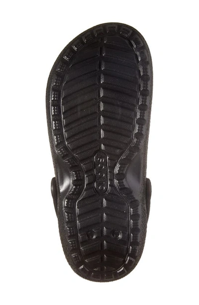 Shop Crocs Classic Glitter Faux Furl Lined Clog In Black