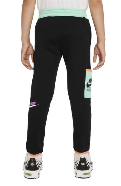 Shop Nike Kids' Illuminate Fleece Cargo Pants In Black