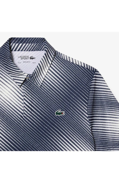 Shop Lacoste Regular Fit Print Stretch Polo Shirt In Ev0 Flour/ Navy Blue