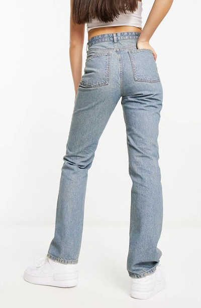 Shop Asos Design '90s Straight Leg Jeans In Mid Blue