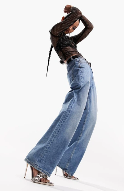 Shop Asos Design Baggy Boyfriend Jeans In Mid Blue