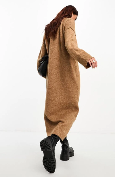 Shop Asos Design Oversize Long Sleeve Knit Midi Sweater Dress In Camel