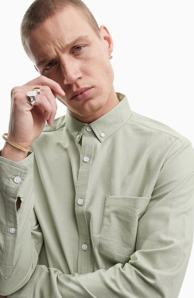 Shop Asos Design Slim Fit Stretch Oxford Button-down Shirt In Light Green