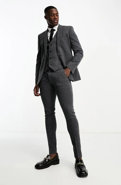 Shop Asos Design Skinny Fit Herringbone Suit Trousers In Charcoal
