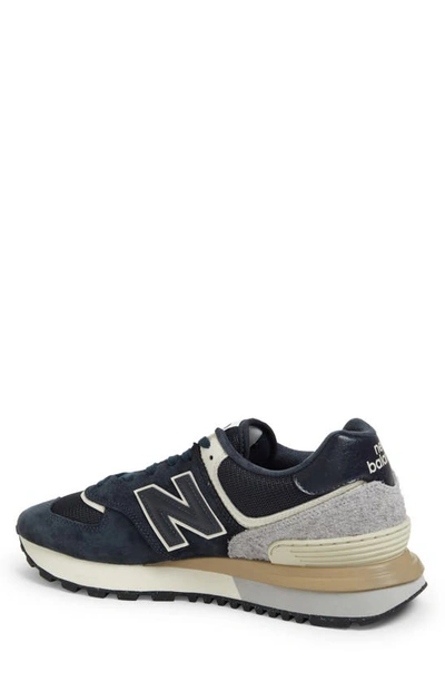 Shop New Balance 574 Sneaker In Blue Navy