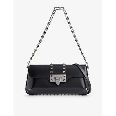 Shop Valentino Garavani Women's Nero Rockstud Leather Clutch Bag