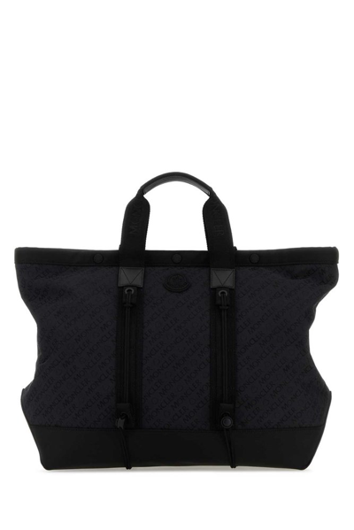 Shop Moncler Logo Patch Top Handle Bag In Black
