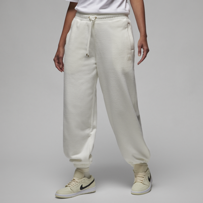 Shop Jordan Women's  Flight Fleece Winterized Pants In White