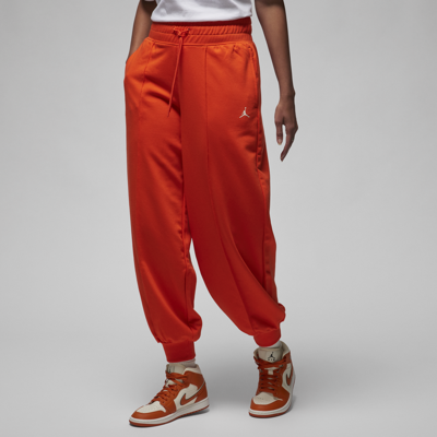Shop Jordan Women's  Sport Fleece Pants In Red