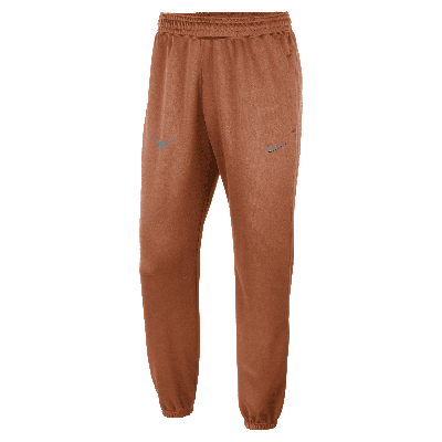 Shop Nike Men's College Dri-fit Spotlight (texas) Pants In Orange
