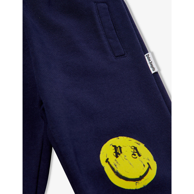 Shop Palm Angels Blue Lem Graphic-print Tapered-leg Cotton-jersey Jogging Bottoms 9-36 Months