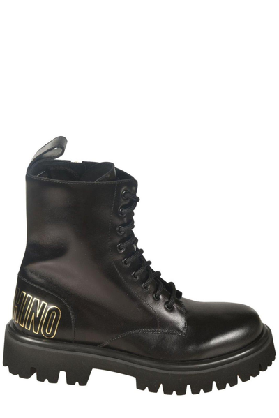Shop Moschino Logo-embossed Lace-up Boots In Nero