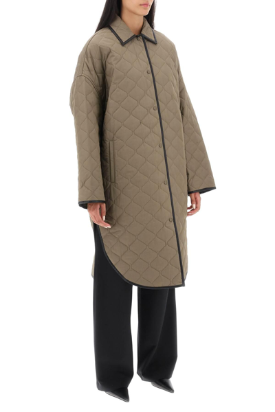 Shop Totême Quilted Cocoon Coat In Green