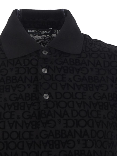 Shop Dolce & Gabbana Flocked Logo Jacquard Polo Shirt In Black