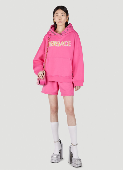 Shop Versace Women Logo Embroidered Hooded Sweatshirt In Pink