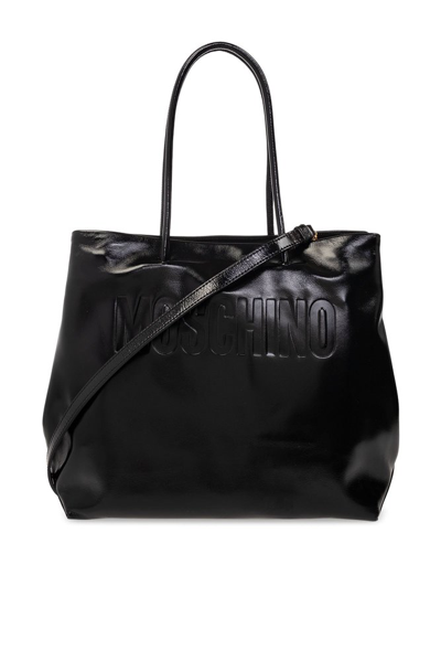 Shop Moschino Logo Embossed Tote Bag In Black
