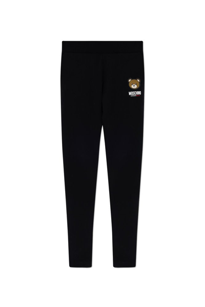 Shop Moschino Logo Patch Tapered Track Pants In Black