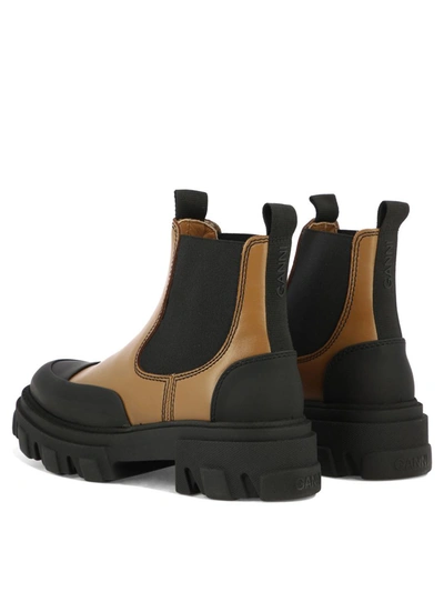 Shop Ganni "cleated Low" Ankle Boots In Brown
