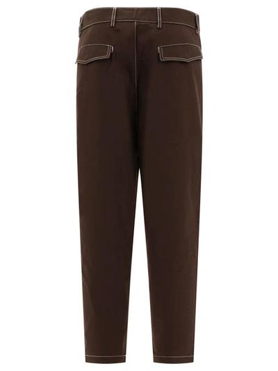 Shop Adish "shajarat Contrast Stitched" Trousers In Brown