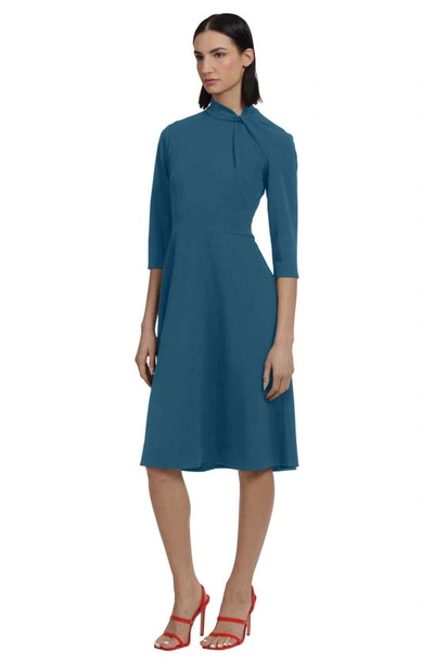 Shop Donna Morgan For Maggy Twist Collar Fit & Flare Dress In Deep Lagoon