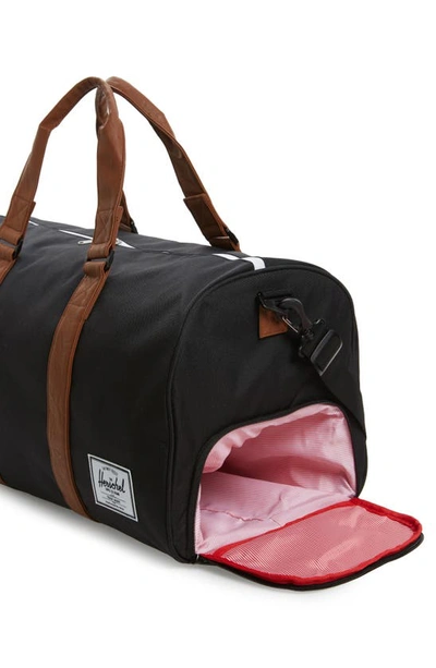 Shop Herschel Supply Co Duffle Bag In Black/ Tan