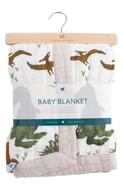 Little Unicorn Cotton Muslin Baby Quilt In Dino Friends