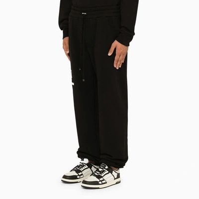 Shop Amiri Jogging Trousers In Black