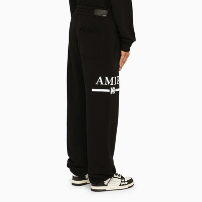 Shop Amiri Jogging Trousers In Black