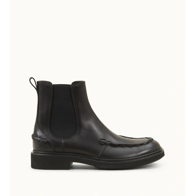 Shop Tod's Clint Ankle Boots In Leather In Black