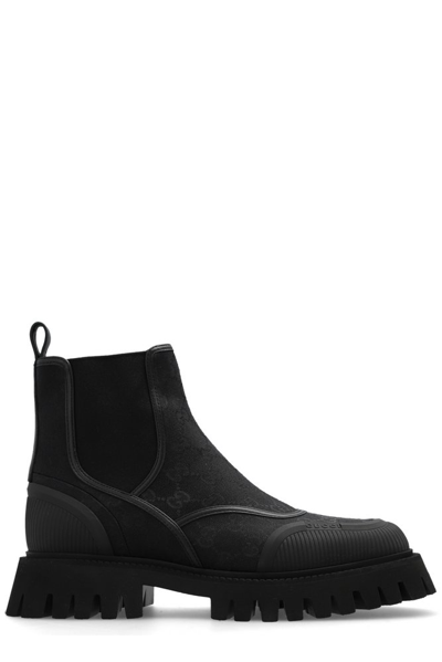 Shop Gucci Monogrammed Ankle Boots In Black
