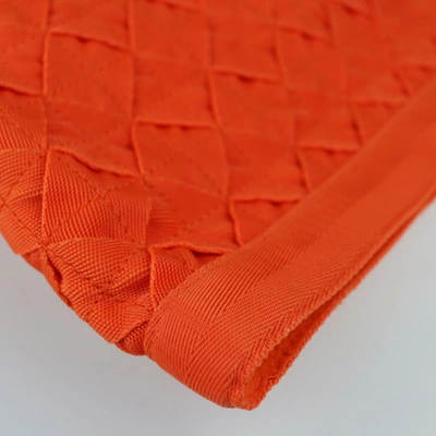 Shop Bottega Veneta Orange Synthetic Clutch Bag ()