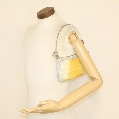 Shop Fendi Yellow Synthetic Clutch Bag ()