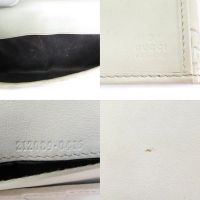 Shop Gucci -- Beige Leather Wallet  ()