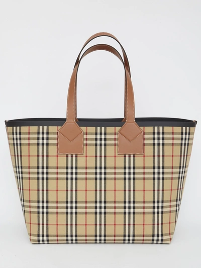 Shop Burberry Large London Tote Bag In Beige