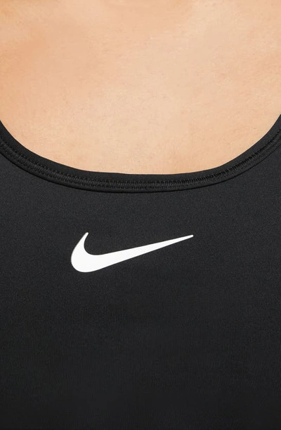 Shop Nike Dri-fit Padded Sports Bra In Black/ White