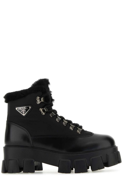 Shop Prada Triangle Logo Plaque Combat Boots In Black