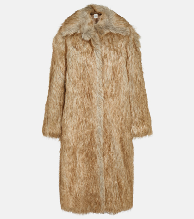 Shop Totême Faux-fur Coat In Beige