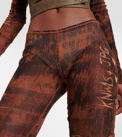 Shop Jean Paul Gaultier X Knwls Printed Jersey Flared Leggings In Brown